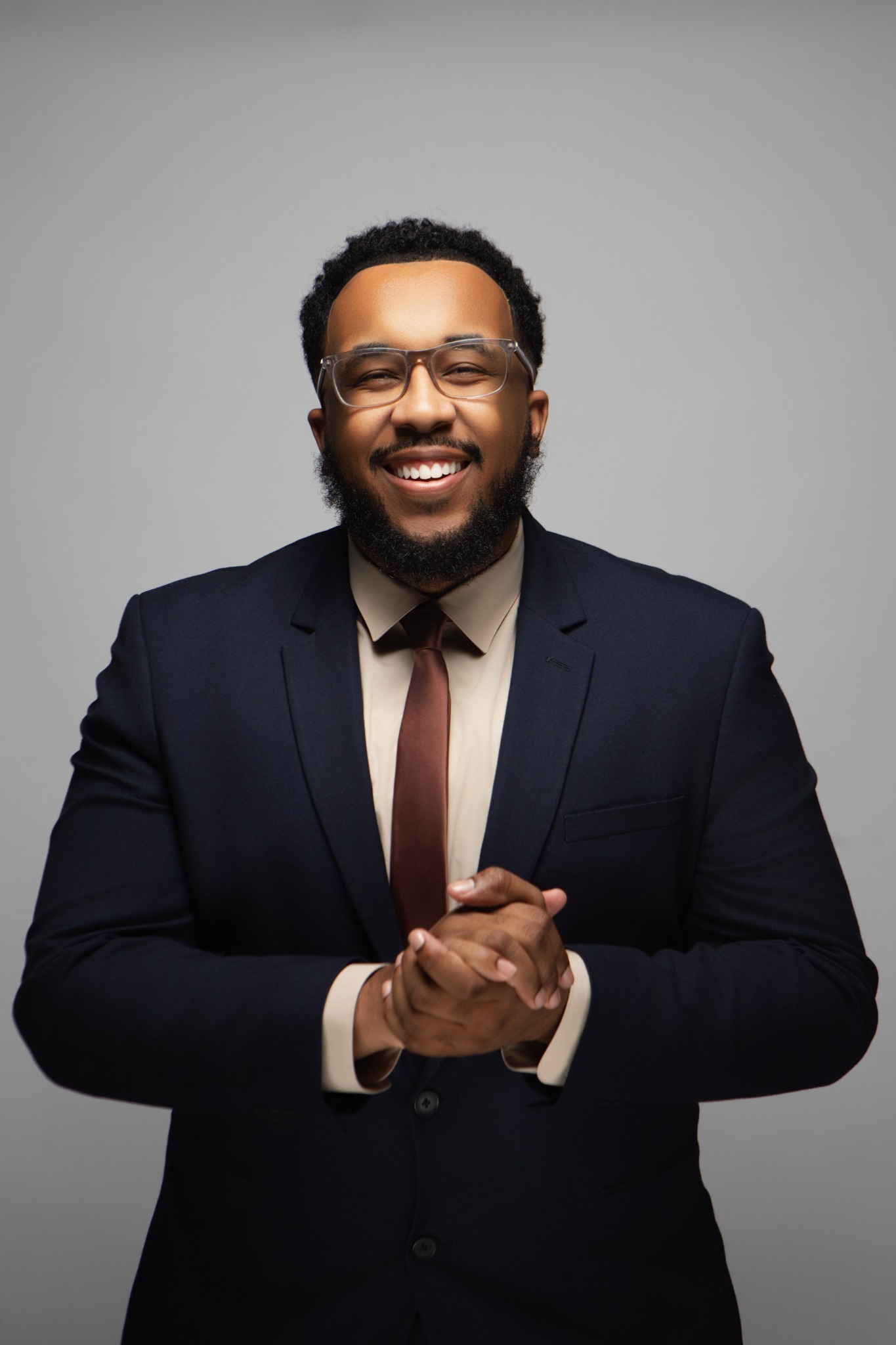 Prophet Andre Frazier in a blue suit